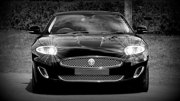 What are the specific requirements for fitting a roll cage in a UK track car?